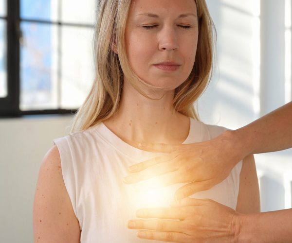 Woman,Enjoying,Energy,Healing,Treatment,.,Heart,Chakra,Balancing,,Unconditional